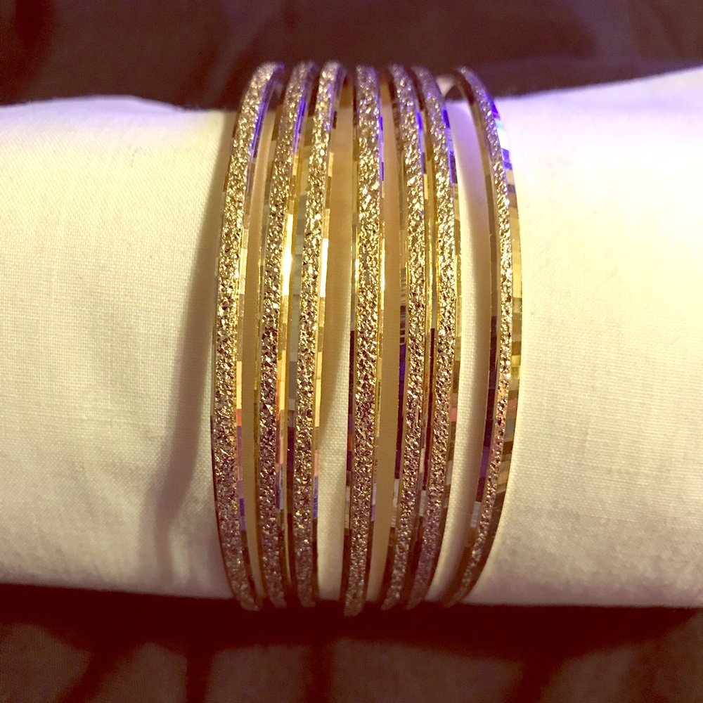Gorgeous Gold Plated set of 7 Bangels